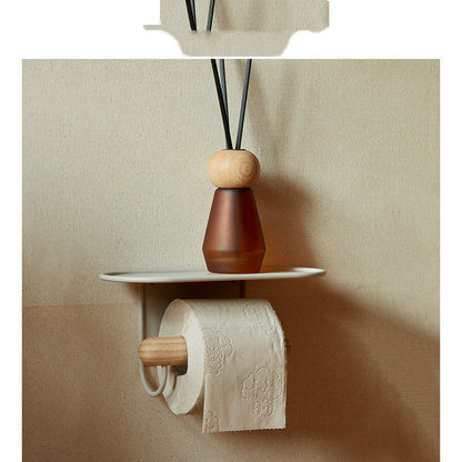 Perforation-free toilet paper rack mounted on a clean white bathroom wall